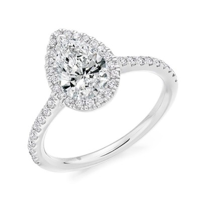 Engagement ring with 1.00 ct center diamond and 0.20 ct side diamonds