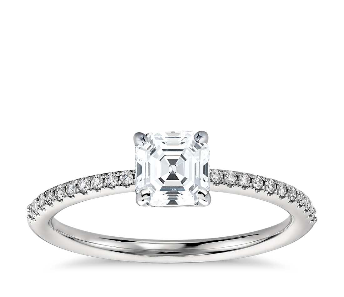 Engagement ring with princess diamonds 0.50 ct and side diamonds 0.30 ct