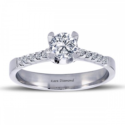 Engagement ring with 0.40 ct center diamond and 0.10 ct side diamonds