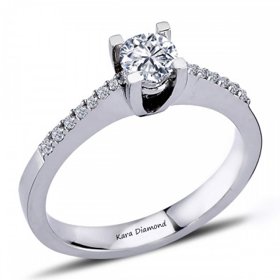 Engagement ring with 0.60 ct center diamond and 0.30 ct side diamonds