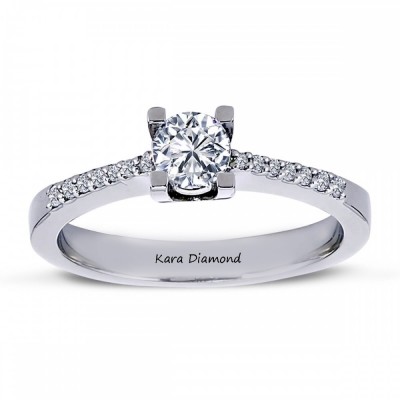 Engagement ring with 0.60 ct center diamond and 0.30 ct side diamonds