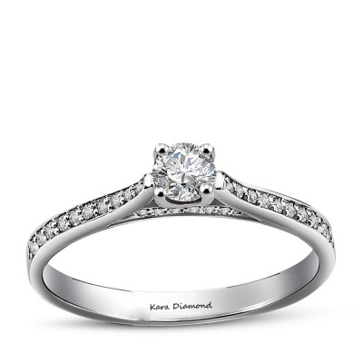 Engagement ring with 0.50 ct center diamond and 0.20 ct side diamonds