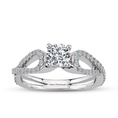 Engagement ring with central diamond of 0.60 ct and side diamonds of 0.40 ct