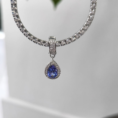 Charm pendant with 0.33 ct diamonds and 1.51 ct Tanzanite