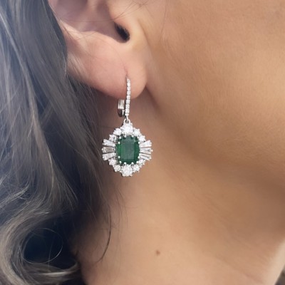 Set with 6.63 ct Emeralds, 2.42 ct Round Diamonds and 1.06 ct Baget Diamonds