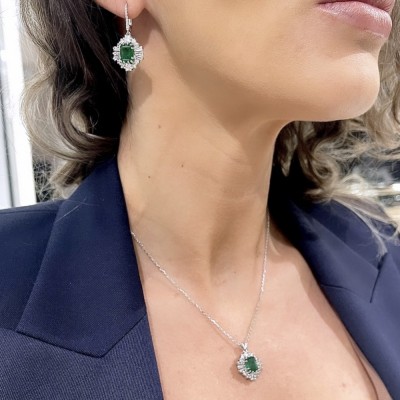 Set with 6.63 ct Emeralds, 2.42 ct Round Diamonds and 1.06 ct Baget Diamonds