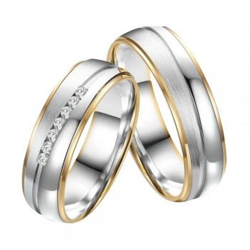 Wedding rings in white and yellow gold with 0.20 ct diamonds