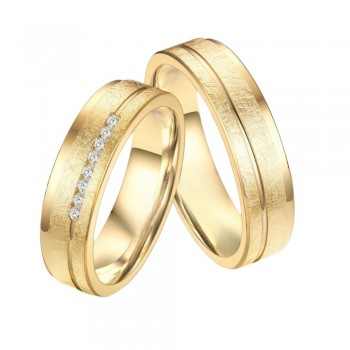Yellow gold wedding rings with 0.20 ct diamonds 