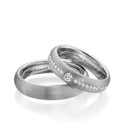 Wedding rings with 0.10ct center white diamond and 0.30ct side diamonds