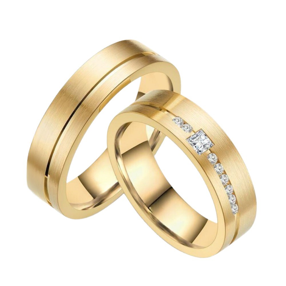 Yellow gold wedding rings with 0.10 ct Princess diamonds and 0.15 ct side diamonds