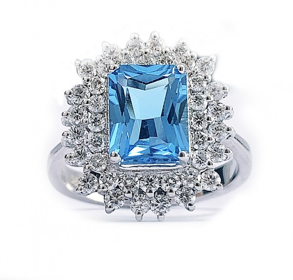 Inel cu Blue Topaz central de 2.68ct si diamante de 0.90 ct