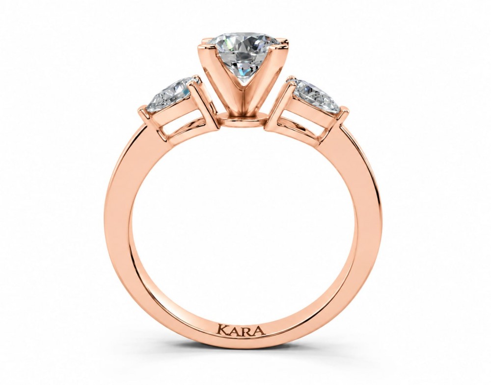Inel de logodna cu diamant central rotund de 0.73ct si diamante laterale Pear Cut de 0.28ct