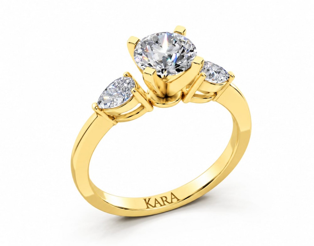 Inel de logodna cu diamant central rotund de 0.73ct si diamante laterale Pear Cut de 0.28ct
