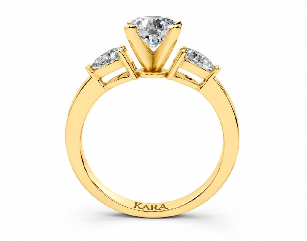 Inel de logodna cu diamant central rotund de 0.73ct si diamante laterale Pear Cut de 0.28ct