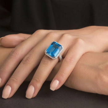 Inel cu Blue Topaz de 14.18 ct si diamante laterale de 0.98 ct